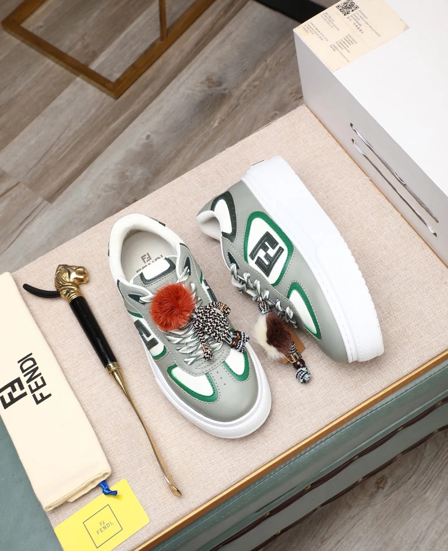 Men's shoes 💰740 Top quality Fendi Match series 25 latest colors Pendant thick sole lace casual FENDI Match lace. Made of light pink leather with white and ocher brown details. Contrast leather FF appliqué on the sides and hiking laces in white, pink and ocher brown. Thick rubber sole with oversized embossed FENDI lettering on the heel. Metal ring charm on the tongue: A small braided doll with contrasting mink fur details and gold metallic FF on the right shoe. The left shoe features a braided cord with contrasting mink double pom poms, metallic FF beads, and Pequin print pattern and logo. Upper: Original custom-made imported first-layer cowhide. Inner lining: Imported custom-made breathable mesh lining. Sole: Original open-molded ultra-light foam material. Bottom thickness: 5CM. Number of yards: women's 35-40 (custom-made 40 non-refundable).